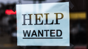 Help Wanted sign at small business