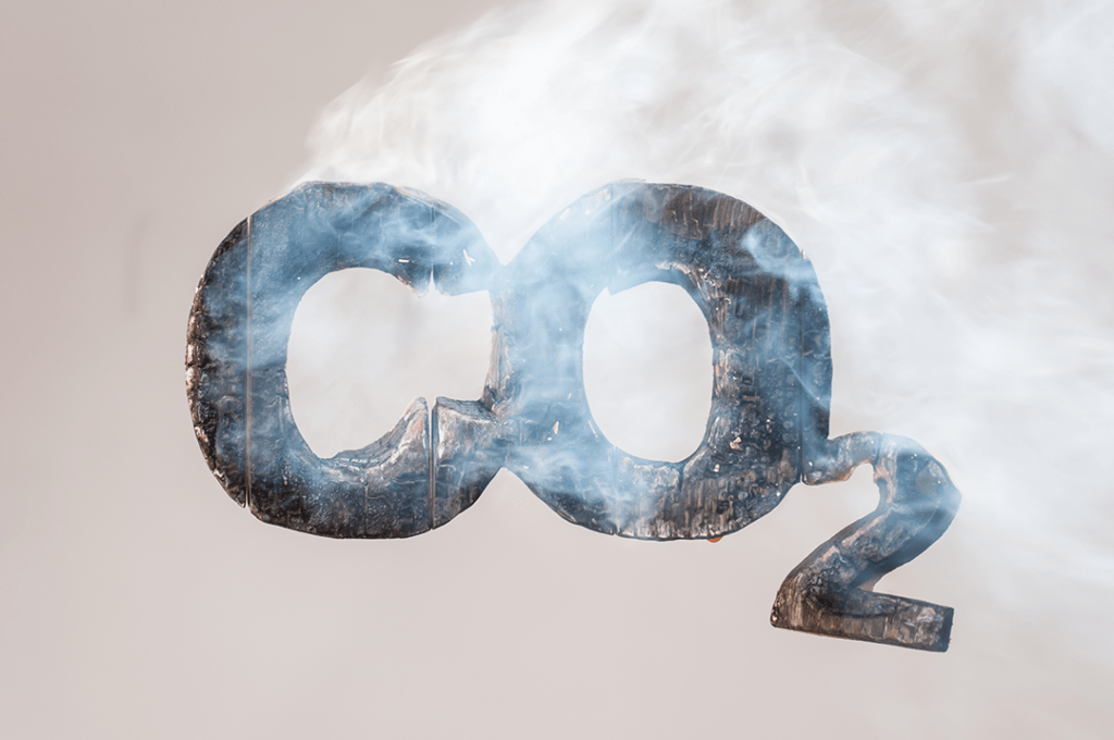An image of a burning, smoking representation of CO2, one of the greenhouse gases that contribute to climate change.