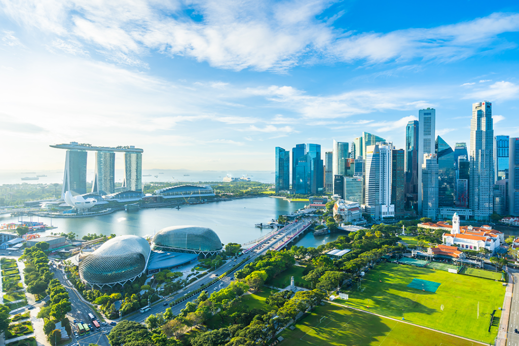 A photo of Singapore's skyline, featuring green spaces and modern architecture as the city-state implements the Singapore Green Plan 2030.